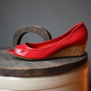 Patent faux leather red Cole Haan peep toe wedge
